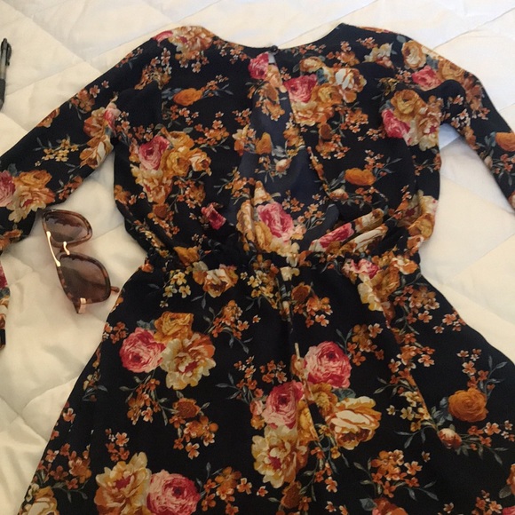 Navy Blue Floral print long sleeve romper. - Picture 2 of 5